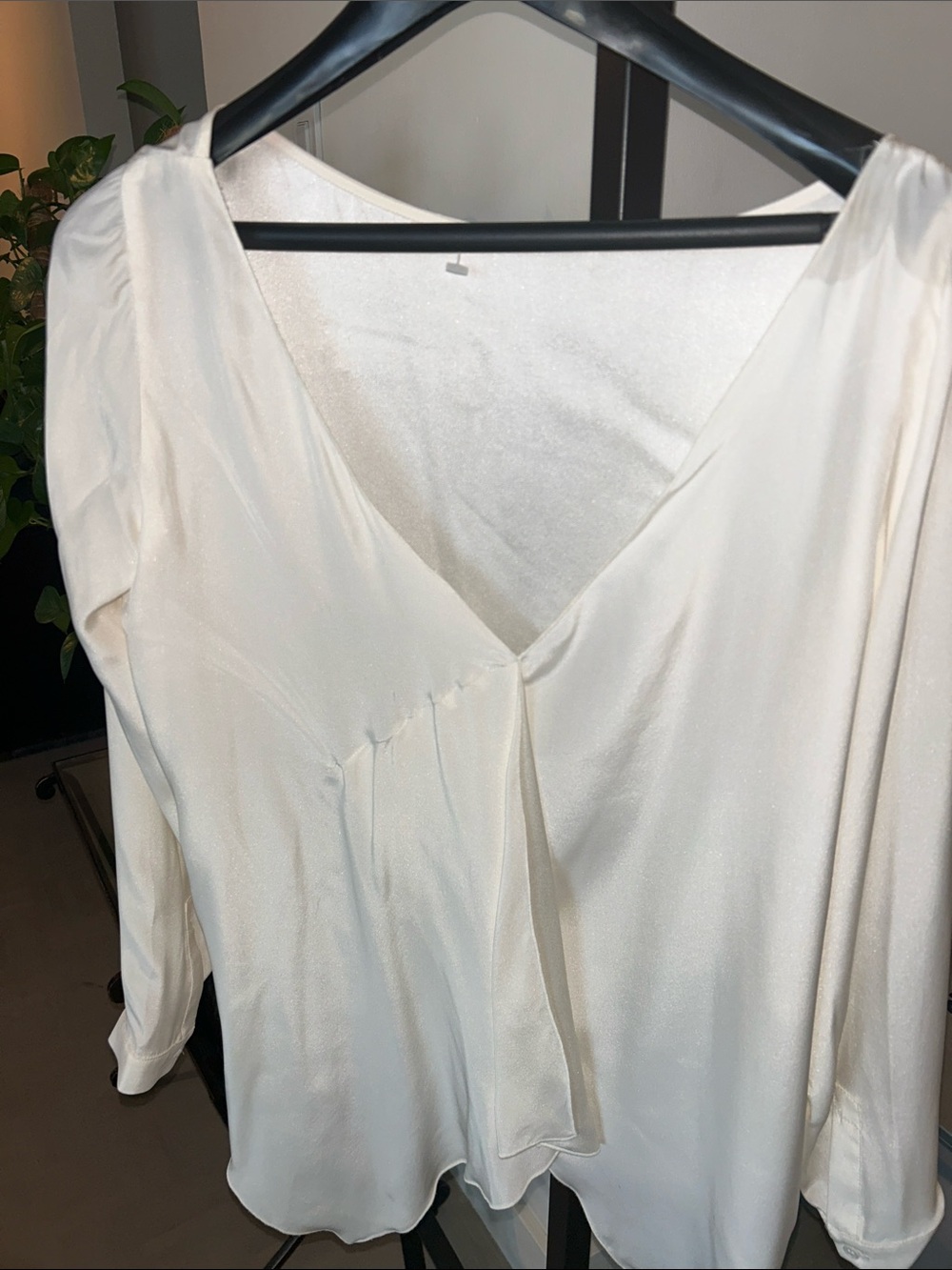 Light Cream 100% silk V-Neck Blouse. Elegant class.  Feels luxurious and sexy.